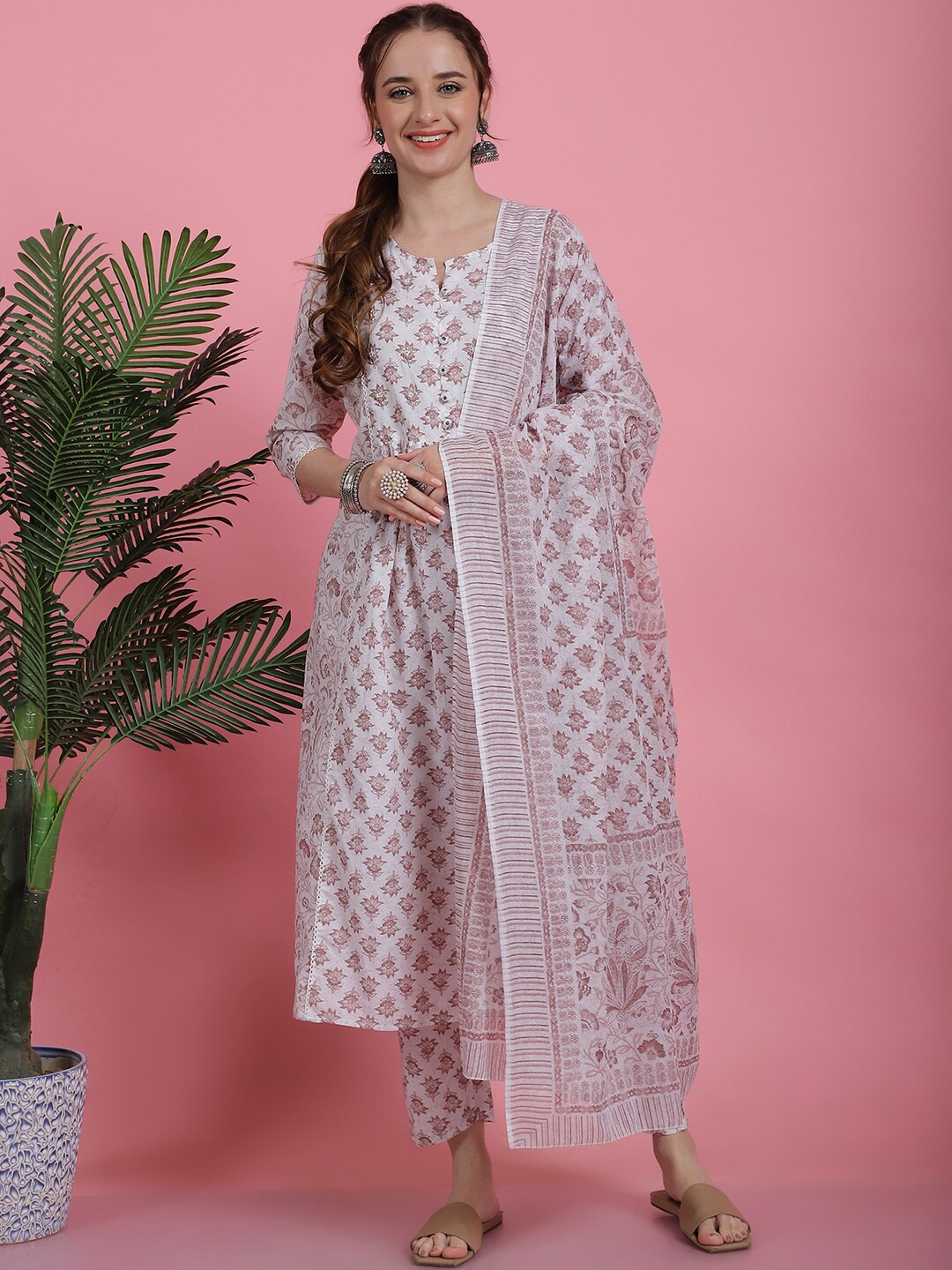 Prakrti Brown Floral Printed Sequinned Pure Cotton Anarkali Kurta & Trousers & Dupatta
Prakrti Brown Floral Printed Sequinned Pure Cotton Anarkali Kurta & Trousers & Dupatta