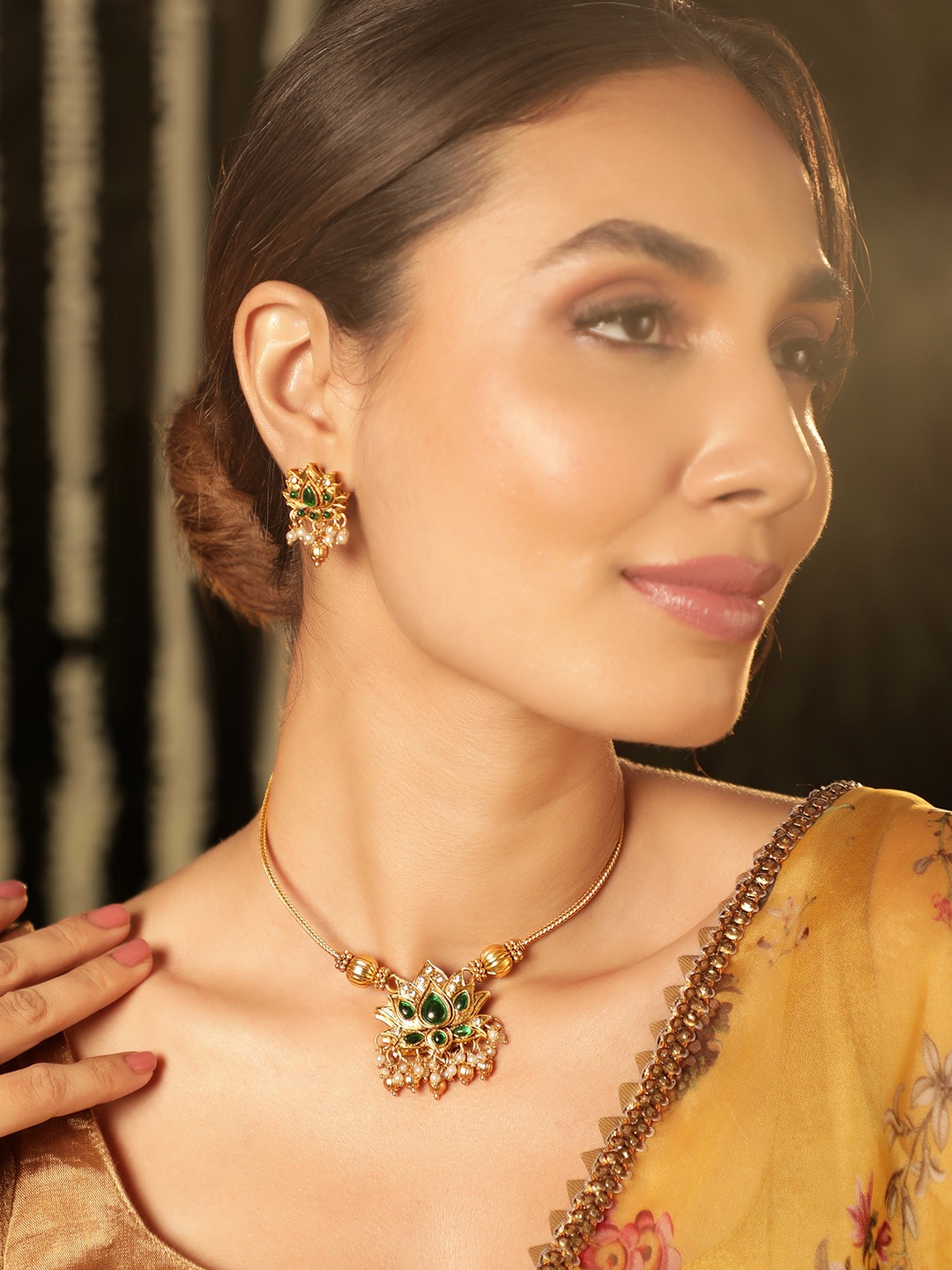 Rubans 22K Gold Plated 2 In 1 Lotus Motif Ruby & Emerald Stone Studded Jewellery Set
Rubans 22K Gold Plated 2 In 1 Lotus Motif Ruby & Emerald Stone Studded Jewellery Set