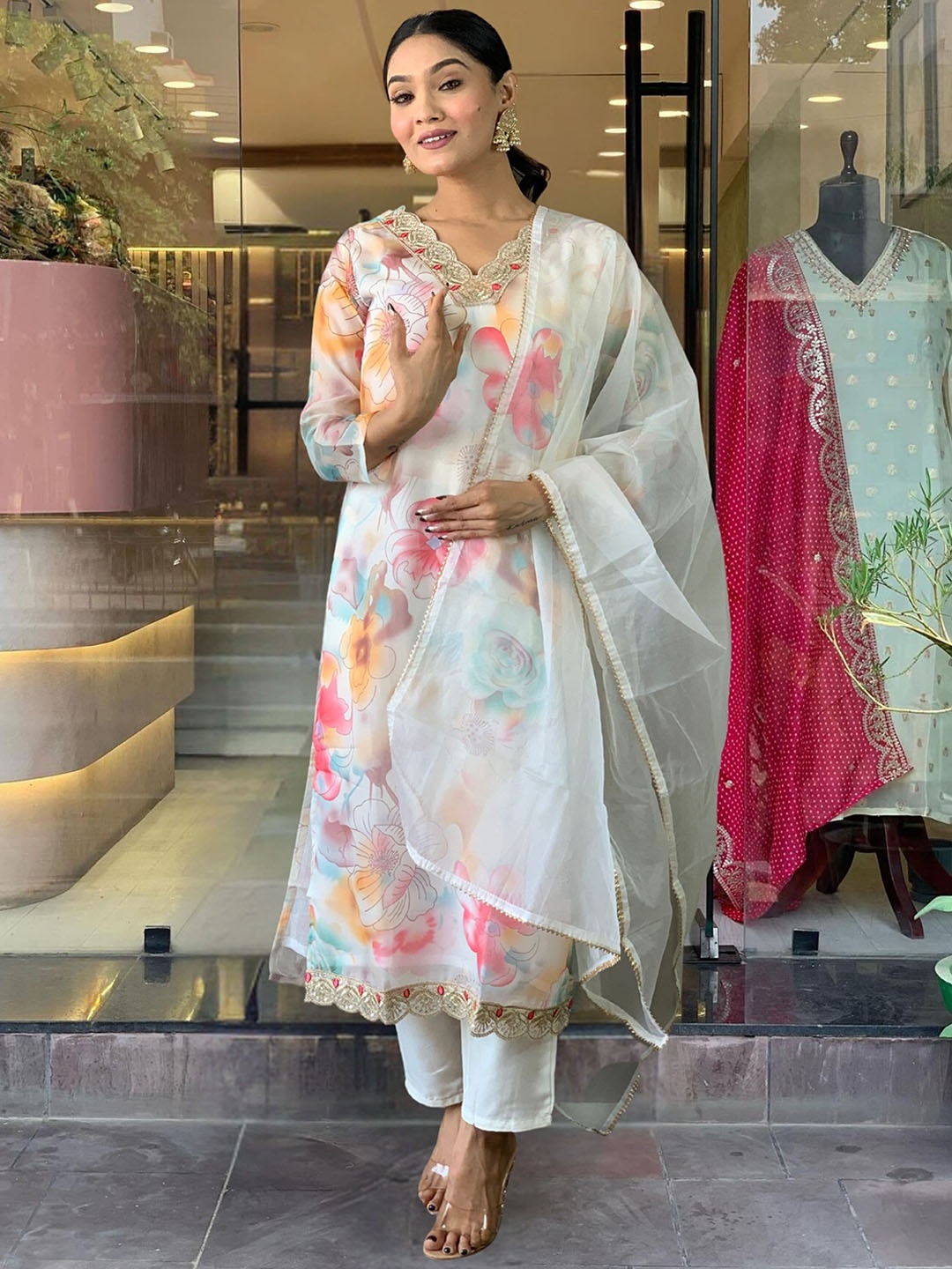 KALINI Floral Printed Regular Sequinned Straight Kurta With Trousers & Dupatta, Cream
KALINI Floral Printed Regular Sequinned Straight Kurta With Trousers & Dupatta, Cream