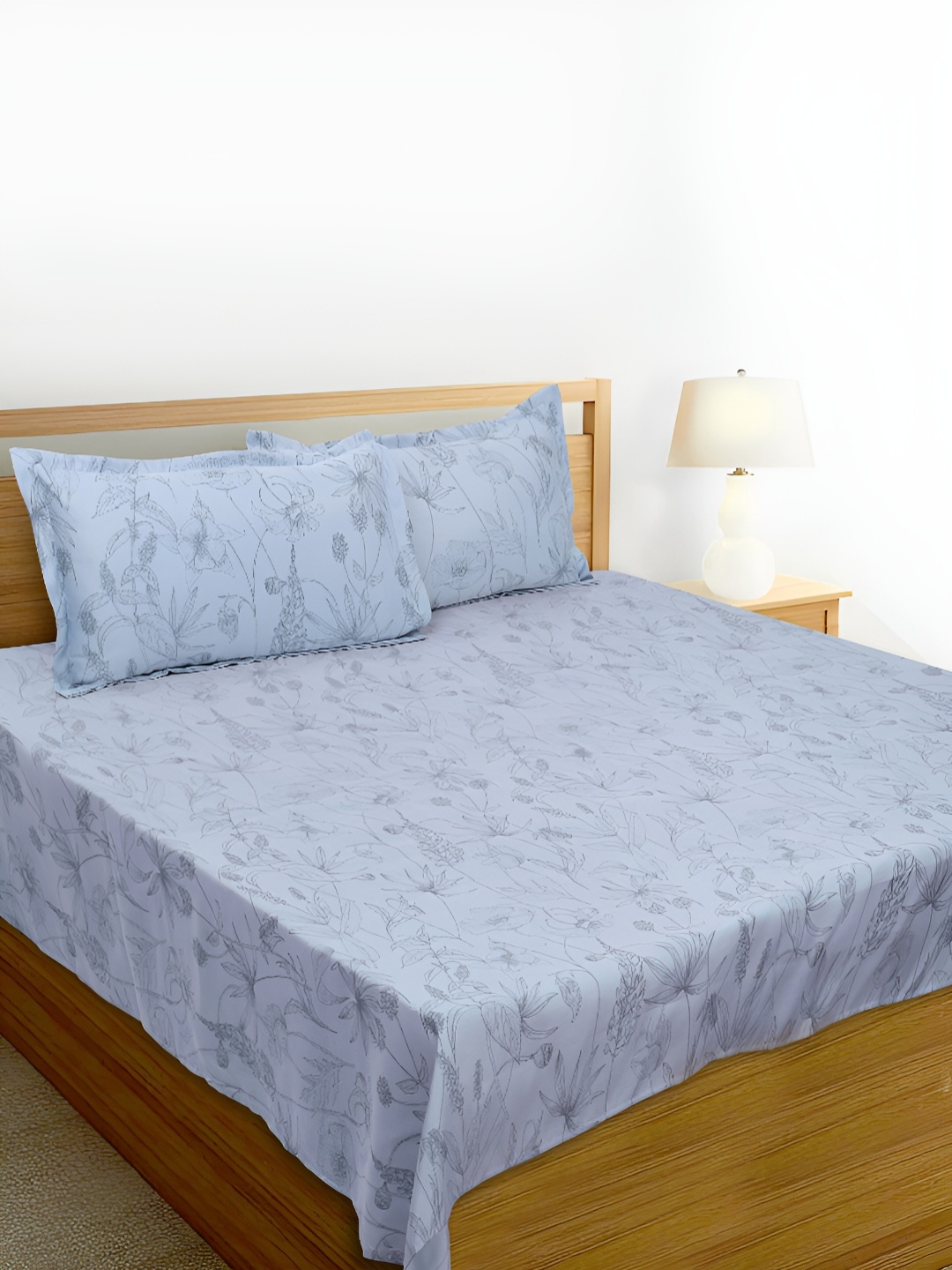 HOME PLUS STUDIOS Glimmer Blue Floral Printed Cotton 400 TC King Bedsheet & 2 Pillow Cover
HOME PLUS STUDIOS Glimmer Blue Floral Printed Cotton 400 TC King Bedsheet & 2 Pillow Cover