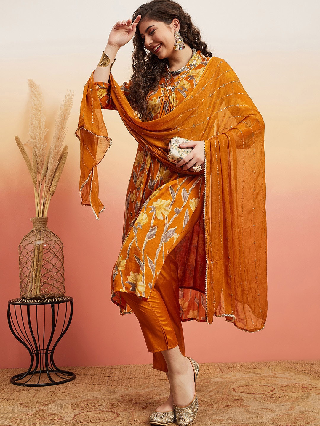 Ishin V Neck Floral Printed Regular Mirror Work Silk Chiffon Straight Kurta Set, Mustard
Ishin V Neck Floral Printed Regular Mirror Work Silk Chiffon Straight Kurta Set, Mustard