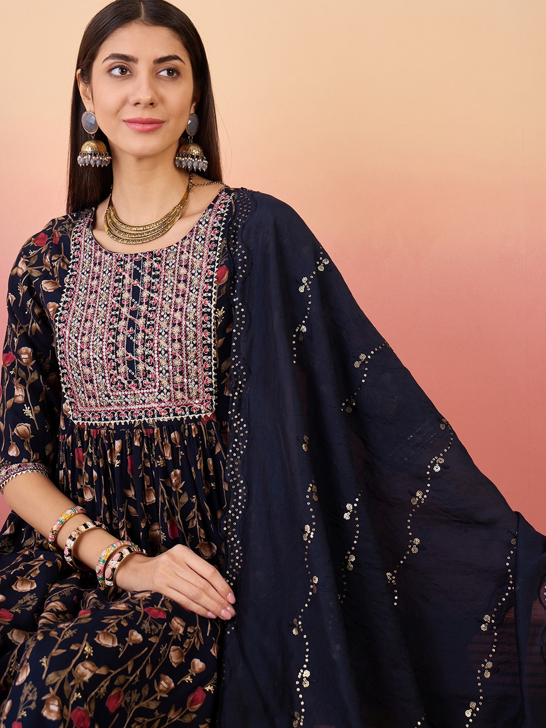 Anouk Navy Blue & Red Floral Printed Pleated Embroidered Kurta with Trousers & Dupatta
Anouk Navy Blue & Red Floral Printed Pleated Embroidered Kurta with Trousers & Dupatta