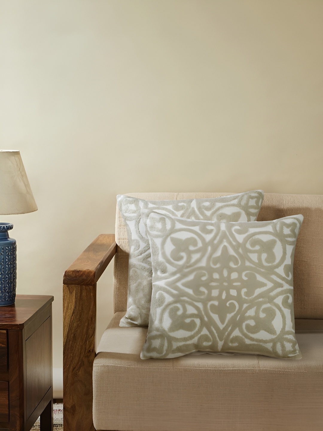Ratan Cart Off White & Beige 2 Pieces Ethnic Motifs Printed Cotton Square Cushion Covers
Ratan Cart Off White & Beige 2 Pieces Ethnic Motifs Printed Cotton Square Cushion Covers