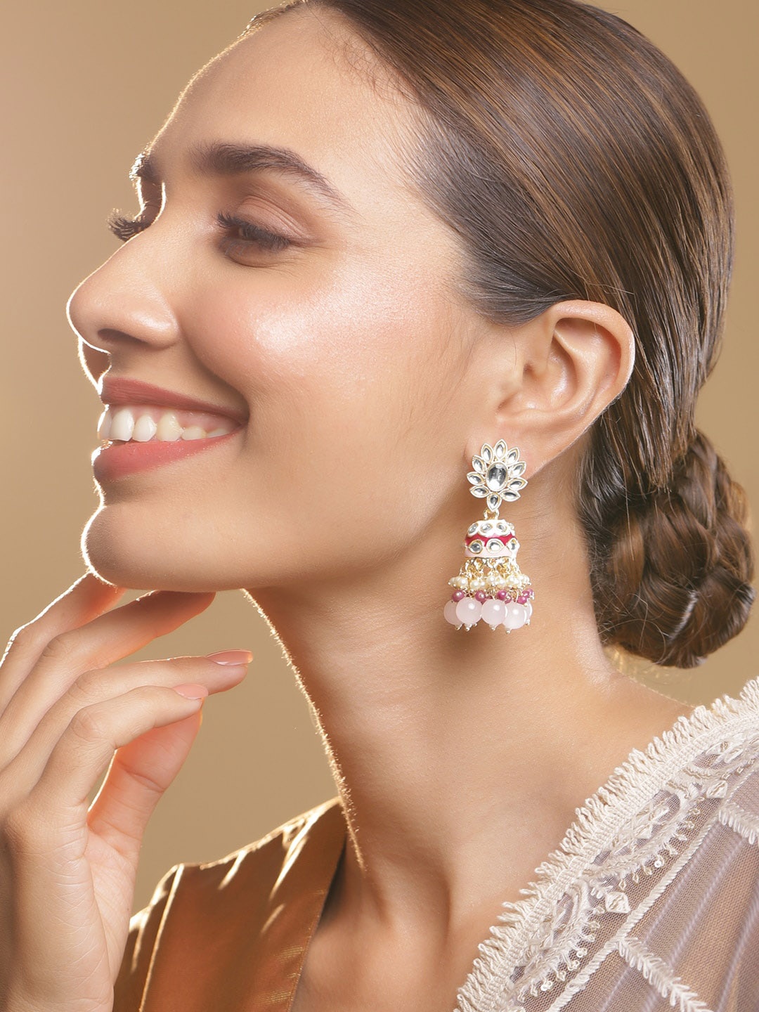 Rubans 22K Gold Plated Red White Enamel Kundan Studed Pastel Pink-White Pearl Beaded Jhumka
Rubans 22K Gold Plated Red White Enamel Kundan Studed Pastel Pink-White Pearl Beaded Jhumka