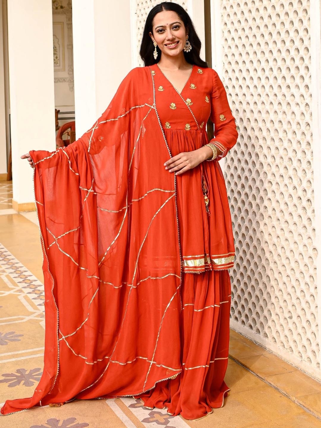 Urbanstree Floral Embroidered Angrakha Gotta Patti Kurta with Sharara & Dupatta, Orange
Urbanstree Floral Embroidered Angrakha Gotta Patti Kurta with Sharara & Dupatta, Orange