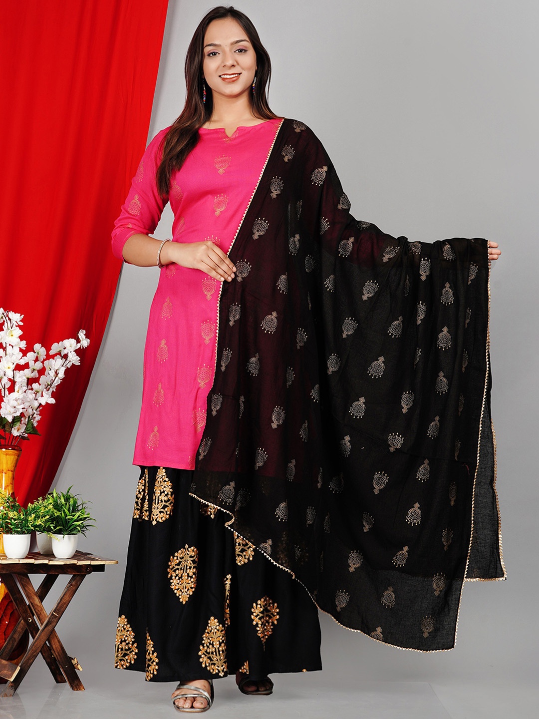 SK2 Fashion Ethnic Motifs Printed Notch Neck Straight Kurta With Sharara & Dupatta, Pink
SK2 Fashion Ethnic Motifs Printed Notch Neck Straight Kurta With Sharara & Dupatta, Pink