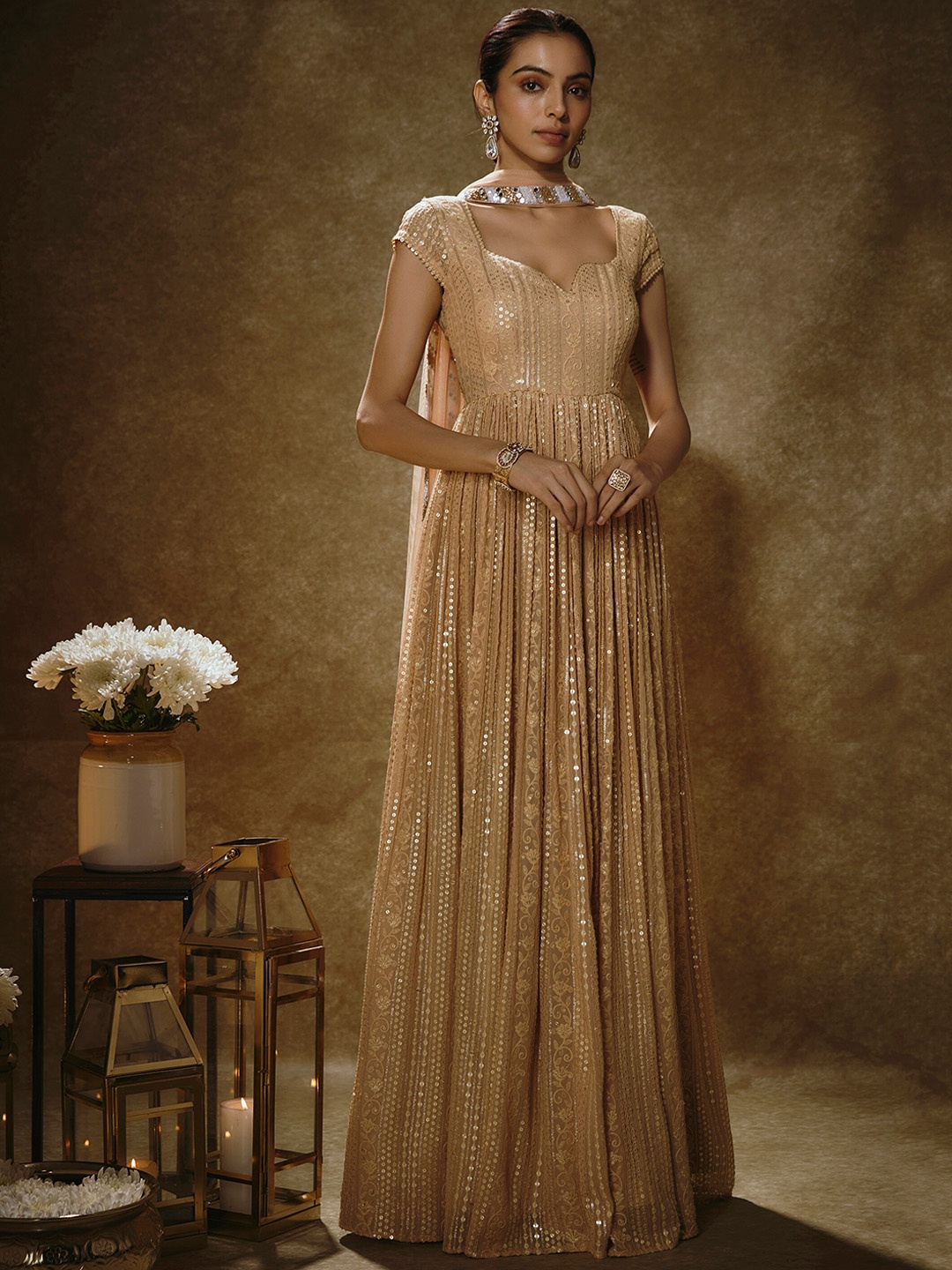 Renee Label Women Printed Angrakha Aari Work Kurta with Skirt & With Dupatta, Rose gold
Renee Label Women Printed Angrakha Aari Work Kurta with Skirt & With Dupatta, Rose gold
