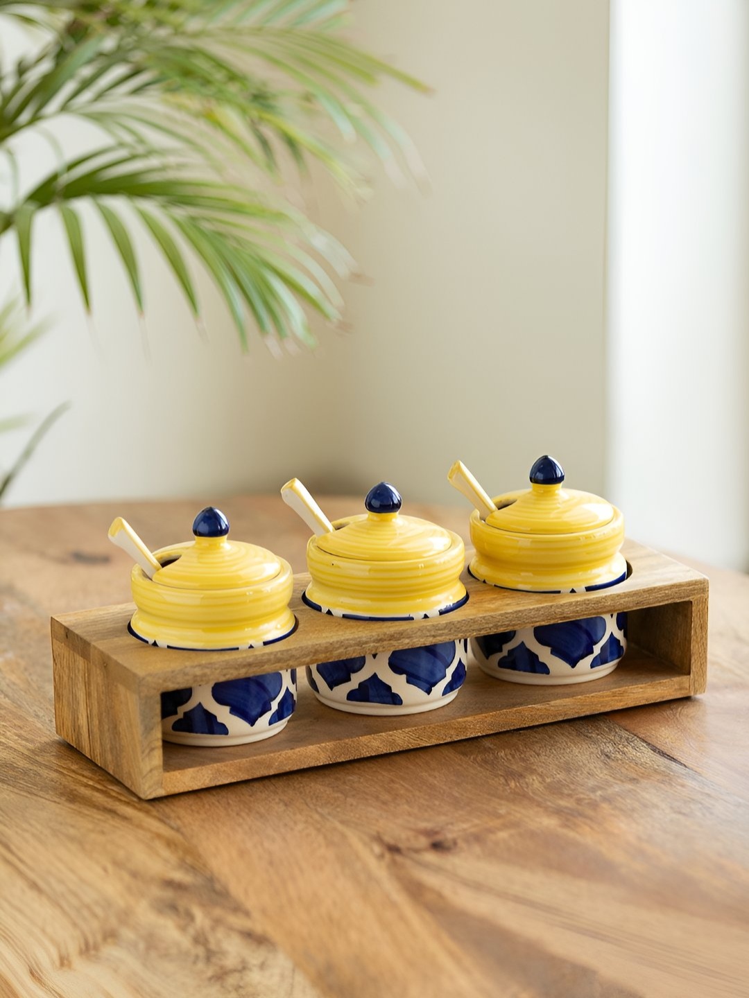 ExclusiveLane Set Of 3 Yellow & Blue Pickle & Chutney Jar Set With Spoons & Wooden Holder
ExclusiveLane Set Of 3 Yellow & Blue Pickle & Chutney Jar Set With Spoons & Wooden Holder