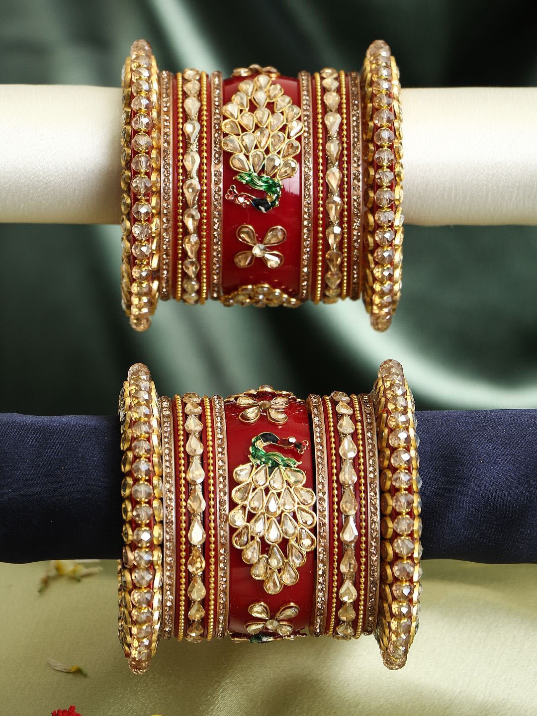 Adwitiya Collection Set Of 26 Gold Plated Peacock Designed Stone Studded Chuda Bangles
Adwitiya Collection Set Of 26 Gold Plated Peacock Designed Stone Studded Chuda Bangles