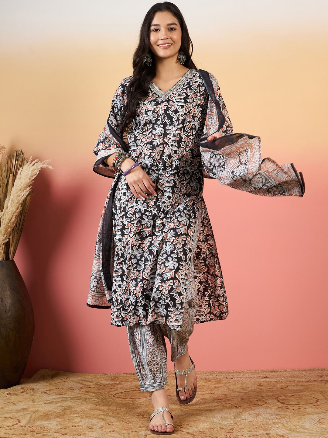 KALINI Women Floral Printed Regular Sequinned Kurta with Trousers & With Dupatta, Black
KALINI Women Floral Printed Regular Sequinned Kurta with Trousers & With Dupatta, Black