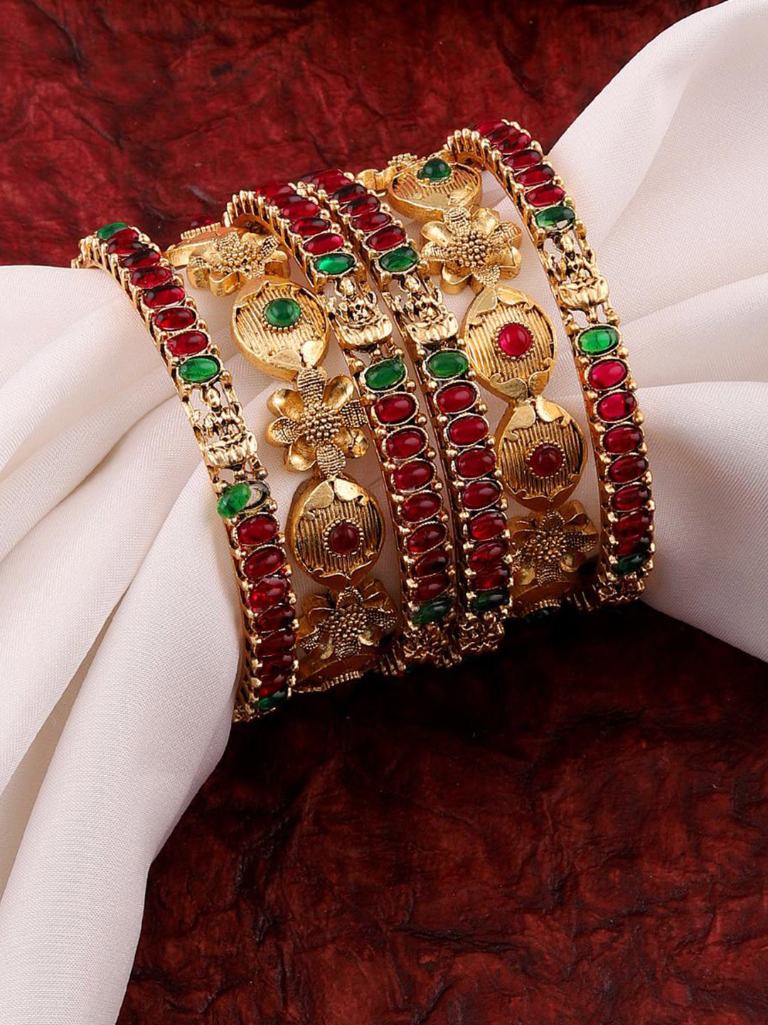 MANSIYAORANGE Set Of 4 Gold-Plated Stone Studded Bangle 
MANSIYAORANGE Set Of 4 Gold-Plated Stone Studded Bangle