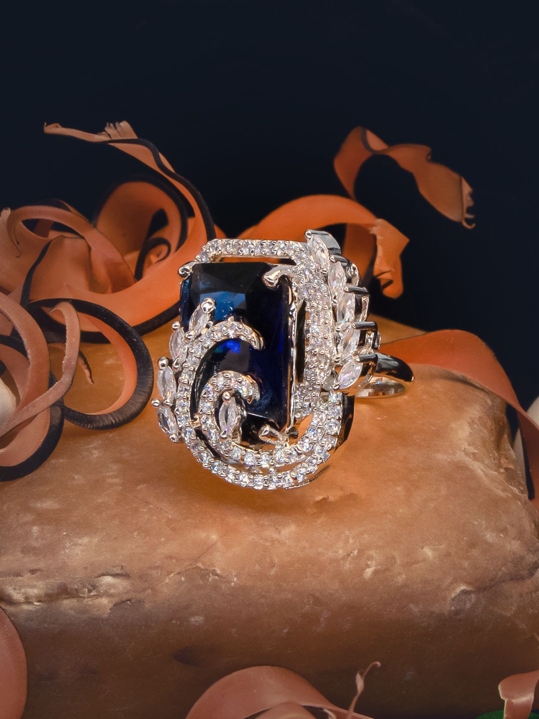 Designs By MANIKYA Rhodium-Plated Cubic Zirconia Stone-Studded Cocktail Finger Ring, Blue
Designs By MANIKYA Rhodium-Plated Cubic Zirconia Stone-Studded Cocktail Finger Ring, Blue