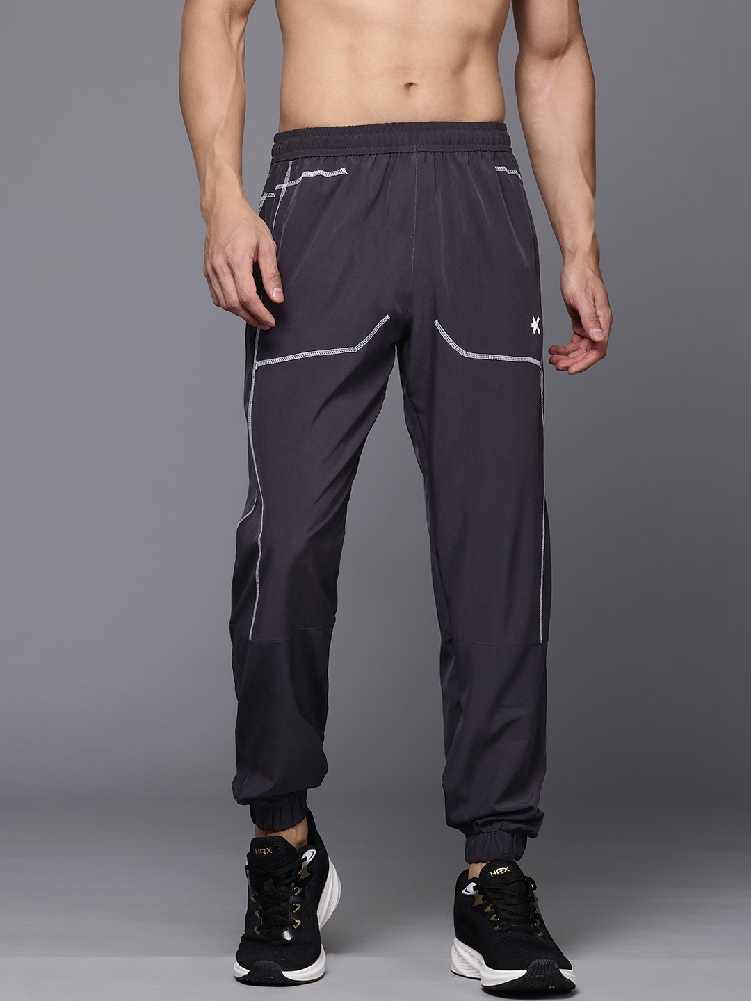 HRX by Hrithik Roshan Men Mid-Rise Training Joggers with Reflective Stripes, Charcoal
HRX by Hrithik Roshan Men Mid-Rise Training Joggers with Reflective Stripes, Charcoal