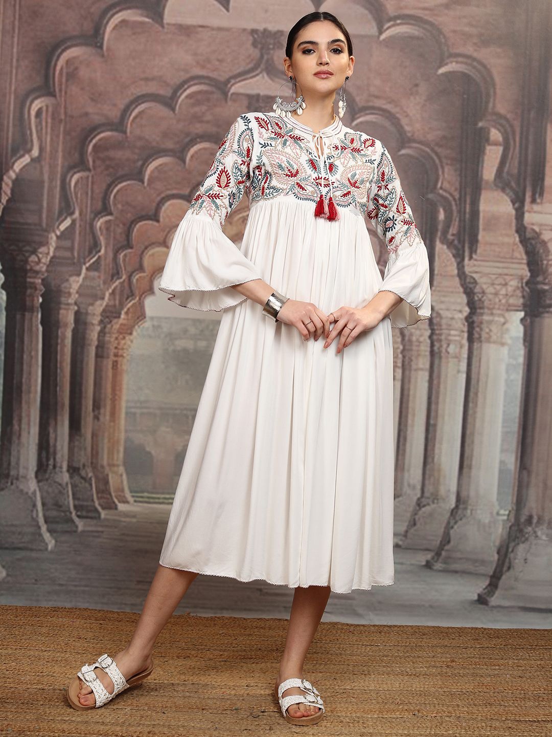 Vishudh White Floral Embroidered Tie-Up Neck Flared Sleeves Velvet A-Line Midi Dress
Vishudh White Floral Embroidered Tie-Up Neck Flared Sleeves Velvet A-Line Midi Dress