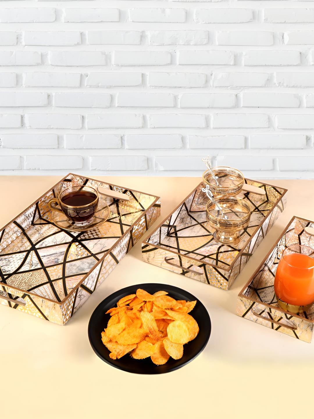THE HOME CO. White & Gold Toned 3 Pieces Geometric Printed Rectangle Wooden Serving Trays
THE HOME CO. White & Gold Toned 3 Pieces Geometric Printed Rectangle Wooden Serving Trays