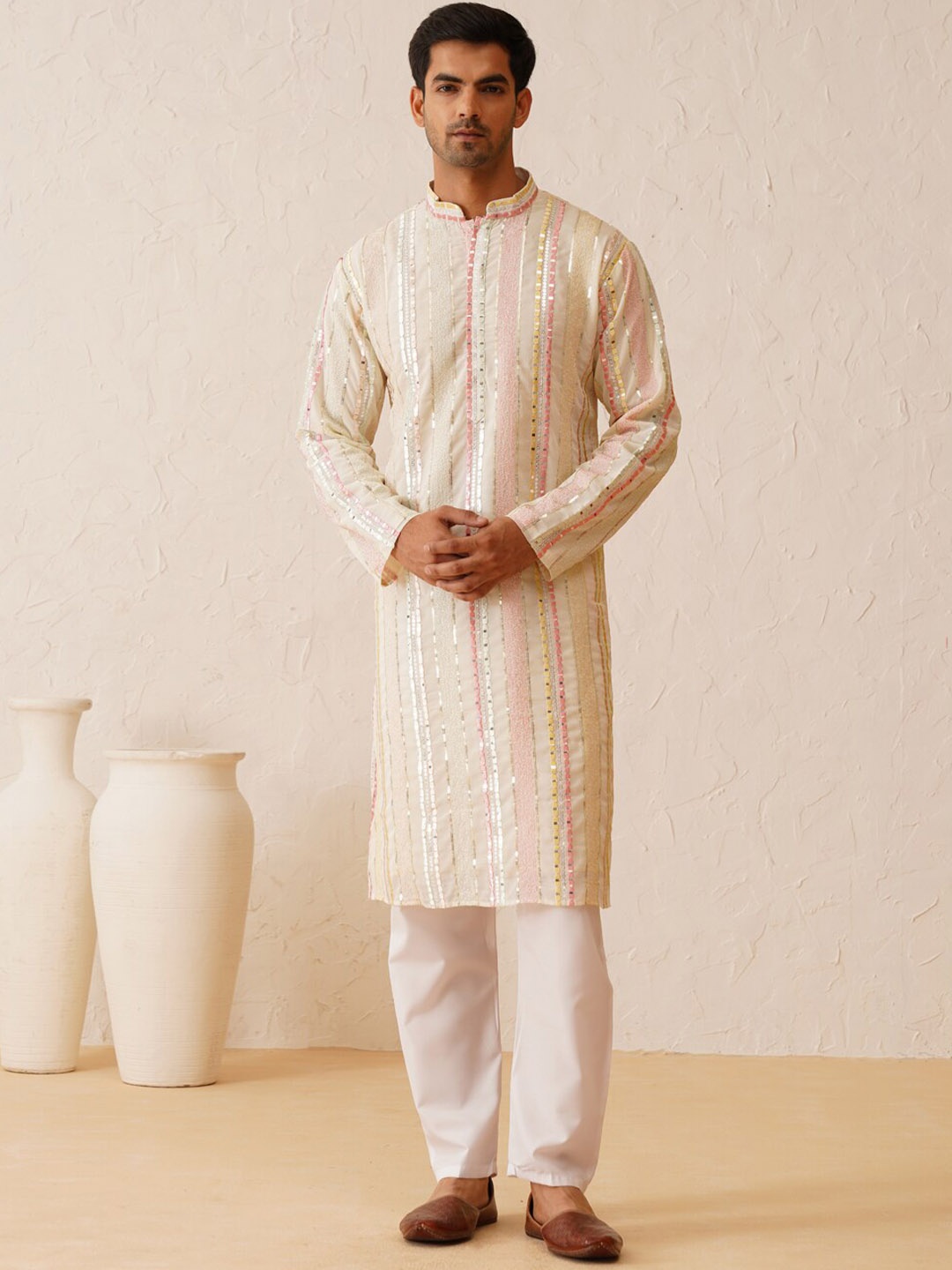 SOJANYA LUXE Embroidered Mandarin Collar Regular Sequinned Kurta with Pyjamas, Off white
SOJANYA LUXE Embroidered Mandarin Collar Regular Sequinned Kurta with Pyjamas, Off white