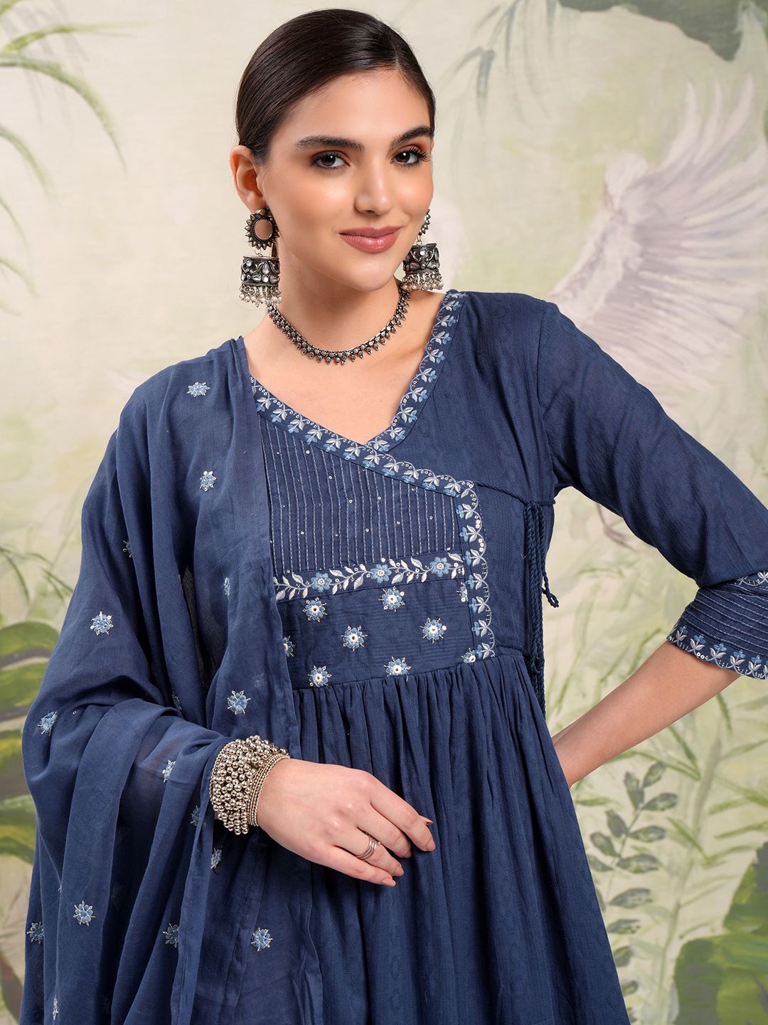 Vishudh Blue Embroidered Mirror Work Pure Cotton Anarkali Kurta With Trousers & Dupatta
Vishudh Blue Embroidered Mirror Work Pure Cotton Anarkali Kurta With Trousers & Dupatta