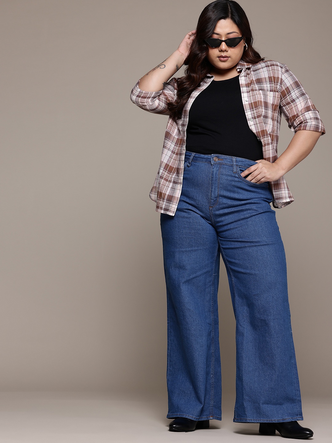 The Roadster Lifestyle Co. Plus Size Women High-Rise Wide Leg Stretchable Jeans, Blue
The Roadster Lifestyle Co. Plus Size Women High-Rise Wide Leg Stretchable Jeans, Blue