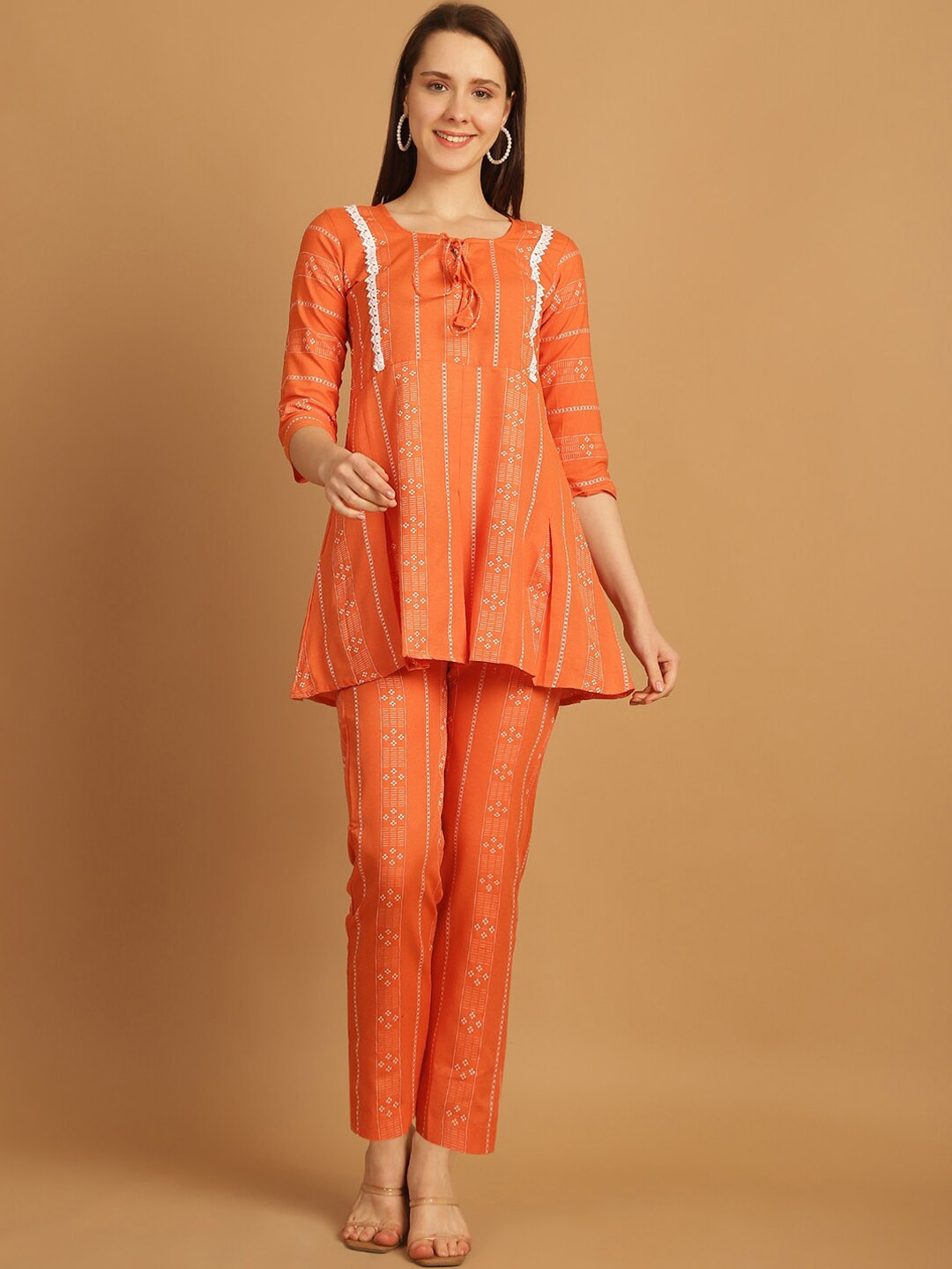Enchanted Drapes Ethnic Motifs Printed Tie-Up Neck Pure Cotton Casual Tunic With Trousers, Orange
Enchanted Drapes Ethnic Motifs Printed Tie-Up Neck Pure Cotton Casual Tunic With Trousers, Orange