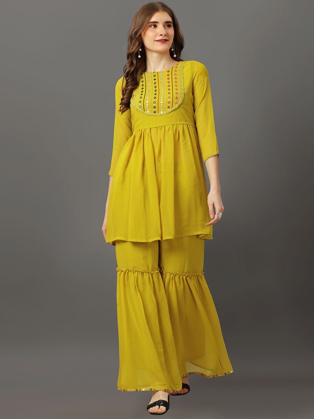 Fashion FRICKS Floral Embroidered Regular Thread Work Georgette A-Line Kurti With Sharara, Yellow
Fashion FRICKS Floral Embroidered Regular Thread Work Georgette A-Line Kurti With Sharara, Yellow