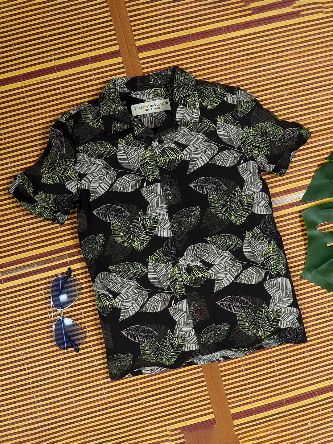 The Lion and The Fish Boys Relaxed Fit Electric Leaf Printed Cuban Collar Shirt, Black
The Lion and The Fish Boys Relaxed Fit Electric Leaf Printed Cuban Collar Shirt, Black