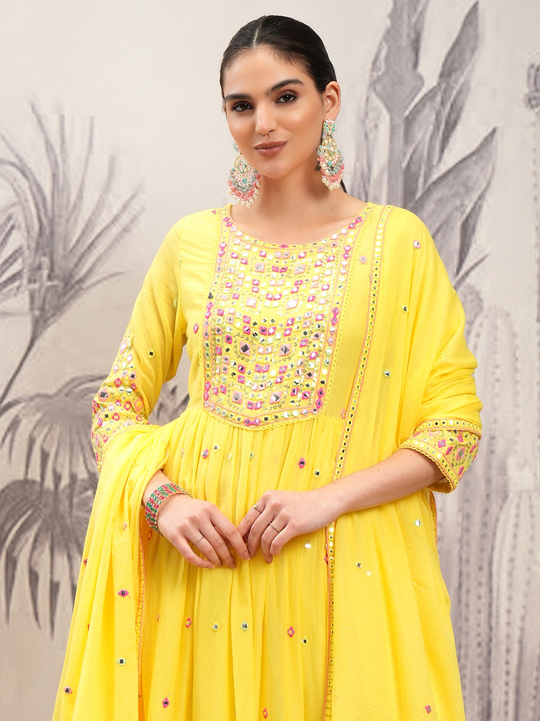 Vishudh Yellow Embroidered Mirror Work Pure Cotton Anarkali Kurta With Trousers & Dupatta
Vishudh Yellow Embroidered Mirror Work Pure Cotton Anarkali Kurta With Trousers & Dupatta