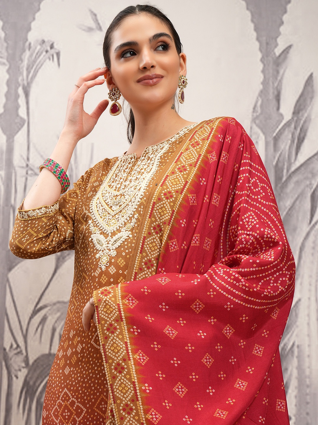Vishudh Brown Ethnic Motifs Regular Thread Work Straight Kurta With Trousers & Dupatta
Vishudh Brown Ethnic Motifs Regular Thread Work Straight Kurta With Trousers & Dupatta