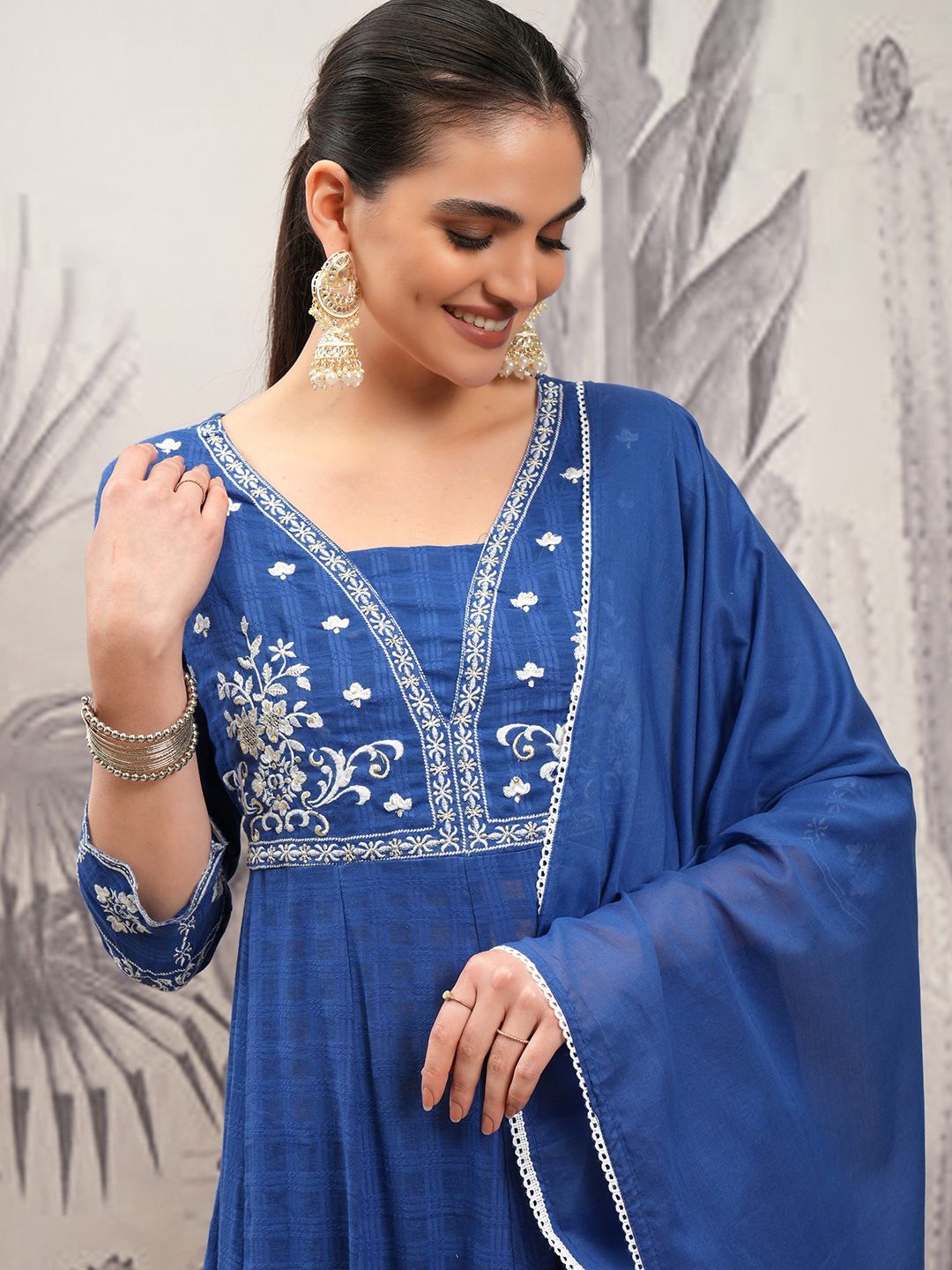 Vishudh Blue Yoke Design Thread Work Pure Cotton Anarkali Kurta With Trousers & Dupatta
Vishudh Blue Yoke Design Thread Work Pure Cotton Anarkali Kurta With Trousers & Dupatta