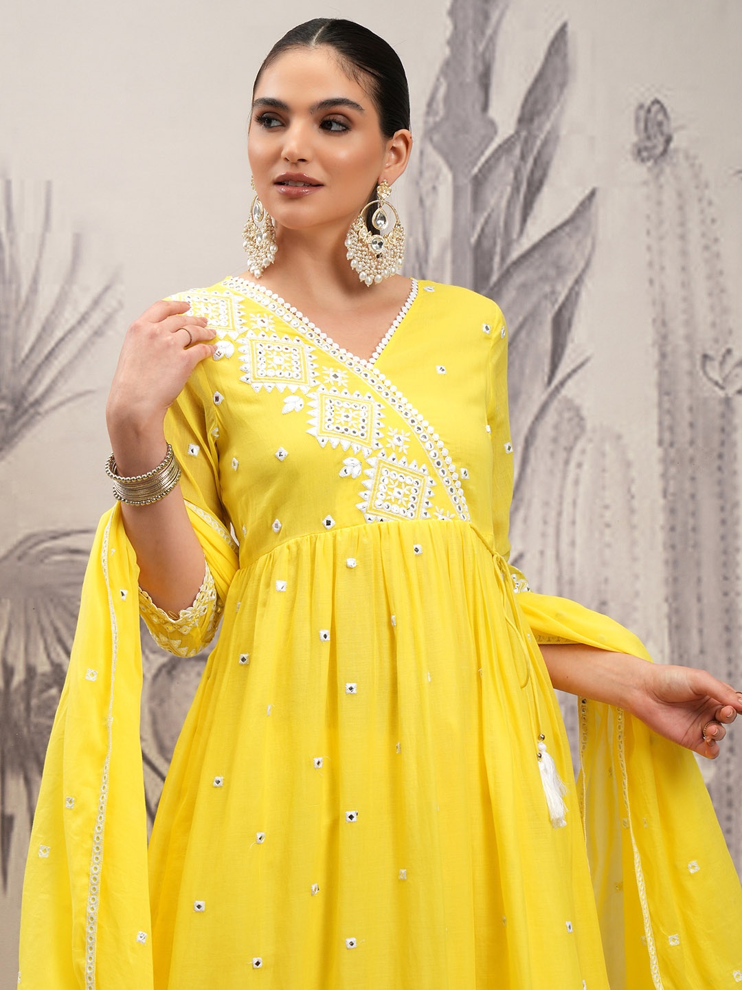 Vishudh Yellow Embroidered Mirror Work Pure Cotton Anarkali Kurta With Trousers & Dupatta
Vishudh Yellow Embroidered Mirror Work Pure Cotton Anarkali Kurta With Trousers & Dupatta