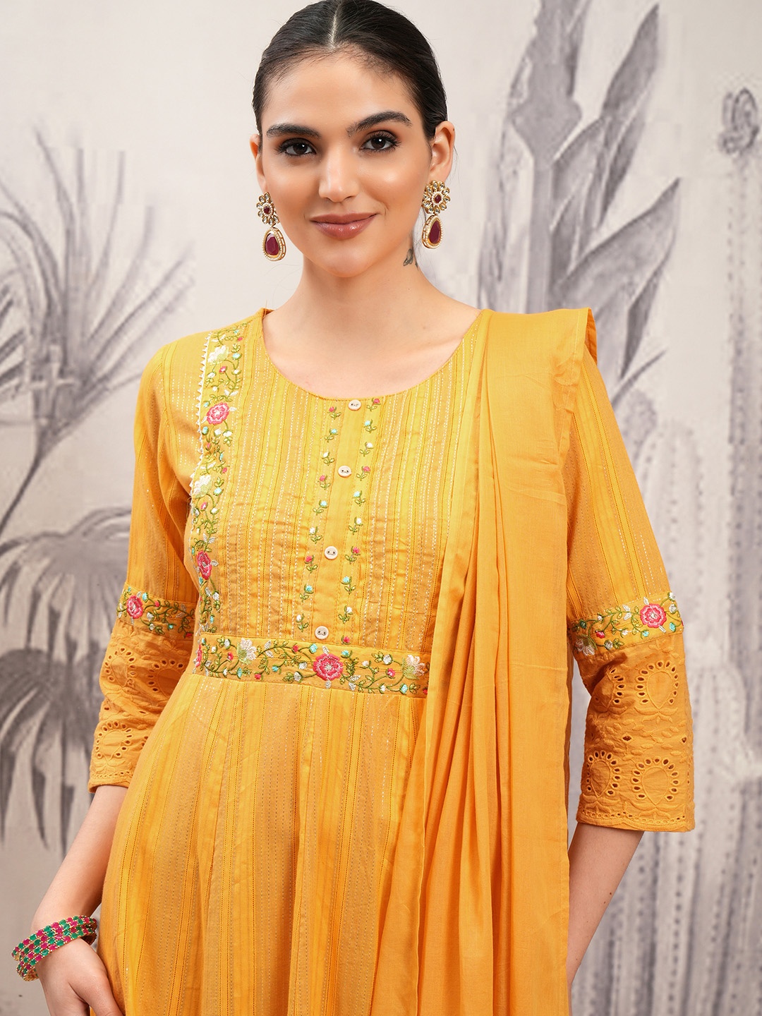 Vishudh Mustard Yellow Thread Work Pure Cotton A-Line Kurta With Trousers & Dupatta
Vishudh Mustard Yellow Thread Work Pure Cotton A-Line Kurta With Trousers & Dupatta