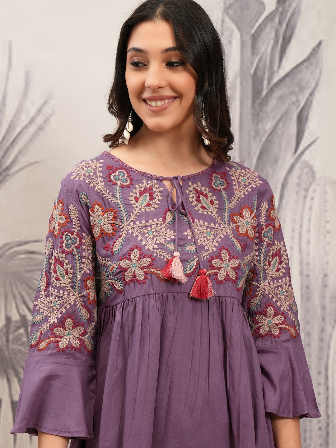 Vishudh Purple Floral Embroidered Tie-Up Neck Bell Sleeves Gathered or Pleated A-Line Top
Vishudh Purple Floral Embroidered Tie-Up Neck Bell Sleeves Gathered or Pleated A-Line Top