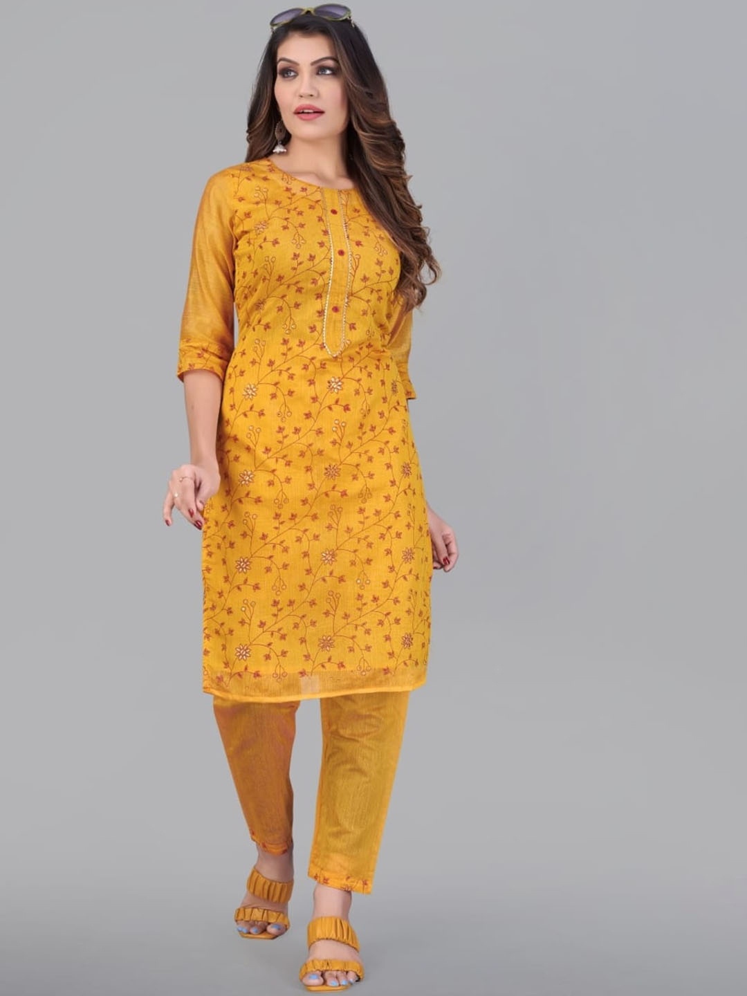 Rujave Floral Printed Round Neck Sequinned Chanderi silk Straight Kurta with Trousers, Orange
Rujave Floral Printed Round Neck Sequinned Chanderi silk Straight Kurta with Trousers, Orange
