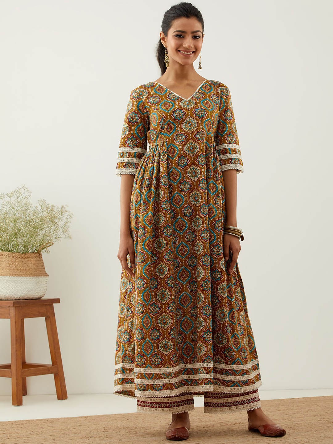 THE INDIAN CAUSE Women Ethnic Motifs Printed Regular Pure Cotton Kurta with Palazzos, Mustard
THE INDIAN CAUSE Women Ethnic Motifs Printed Regular Pure Cotton Kurta with Palazzos, Mustard