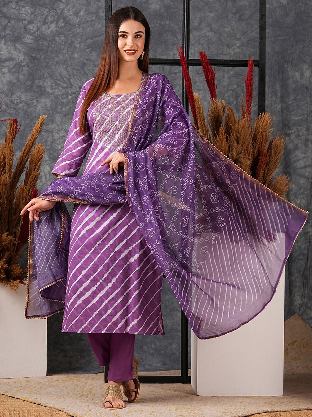 Anni Designer Women Leheriya Printed Regular Kurta with Trousers & With Dupatta, Purple
Anni Designer Women Leheriya Printed Regular Kurta with Trousers & With Dupatta, Purple