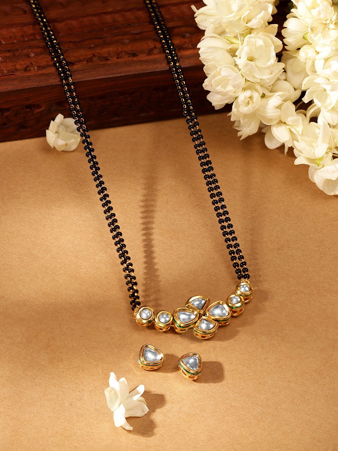 Priyaasi Gold-Plated Kundan Stone Studded & Beaded Mangalsutra With Earrings for Women
Priyaasi Gold-Plated Kundan Stone Studded & Beaded Mangalsutra With Earrings for Women