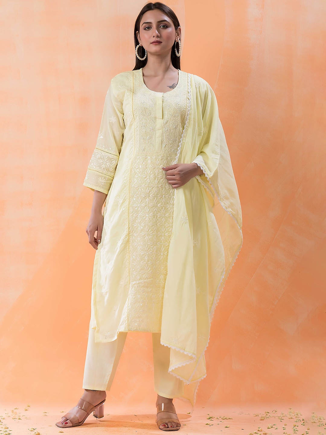 SACRED SUTA Women Floral Embroidered Regular Sequinned Pure Cotton Kurti with Trousers Set, Yellow
SACRED SUTA Women Floral Embroidered Regular Sequinned Pure Cotton Kurti with Trousers Set, Yellow
