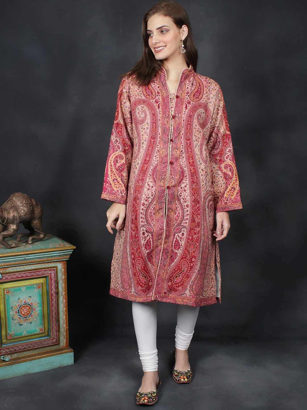 Exotic India Women Woollen Kashimiri Woolen Paisley Motifs Longline Tailored Jacket, Red
Exotic India Women Woollen Kashimiri Woolen Paisley Motifs Longline Tailored Jacket, Red