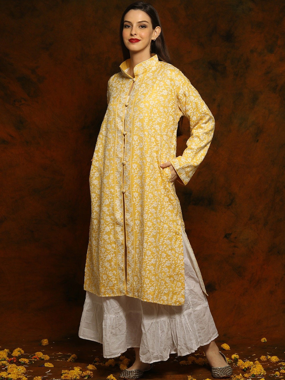 Exotic India Kashmiri Yellow Woolen Long Jacket with Floral and Paisley Aari Embroidery
Exotic India Kashmiri Yellow Woolen Long Jacket with Floral and Paisley Aari Embroidery