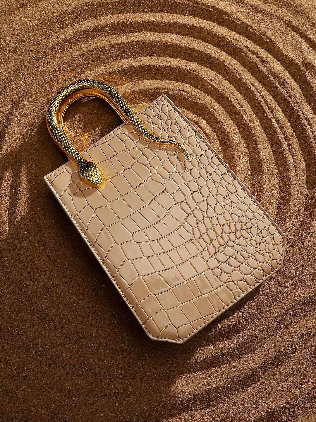HAUTE SAUCE by Campus Sutra Textured Leather Half Moon Handheld Bag with Quilted, Beige
HAUTE SAUCE by Campus Sutra Textured Leather Half Moon Handheld Bag with Quilted, Beige