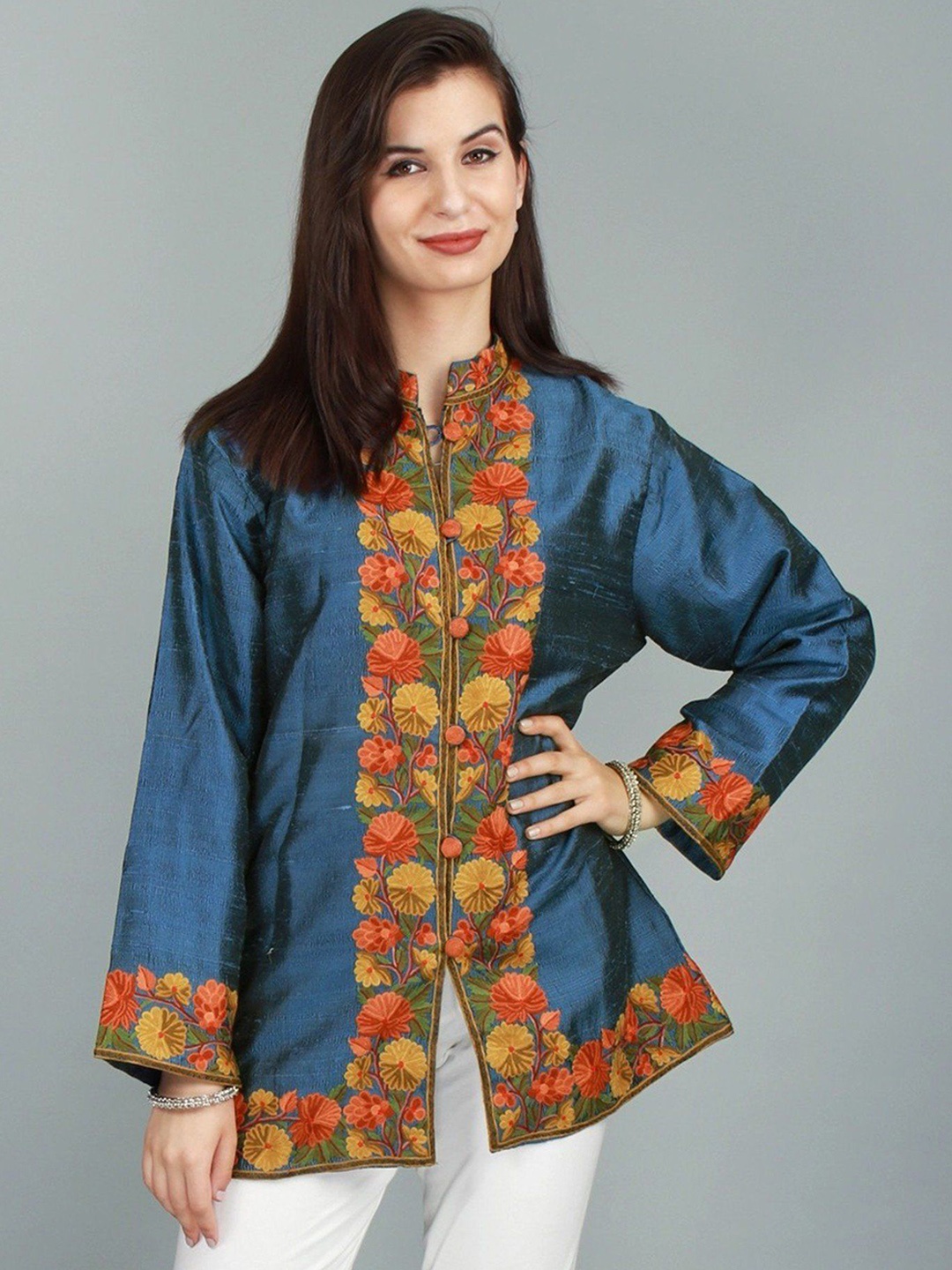 Exotic India Deja Vu-Blue Mandarin Kashmiri Jacket with Vibrant Kashida Embroidered Flower
Exotic India Deja Vu-Blue Mandarin Kashmiri Jacket with Vibrant Kashida Embroidered Flower