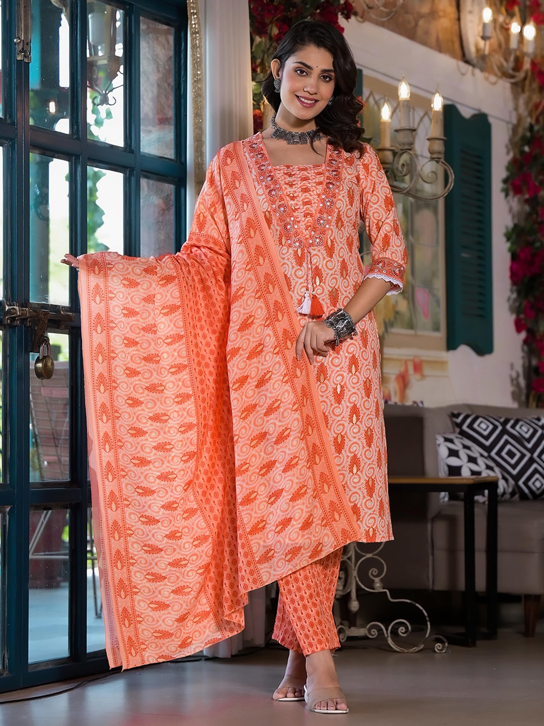 KALINI Women Floral Printed Regular Mirror Work Kurta with Trousers & With Dupatta, Orange
KALINI Women Floral Printed Regular Mirror Work Kurta with Trousers & With Dupatta, Orange
