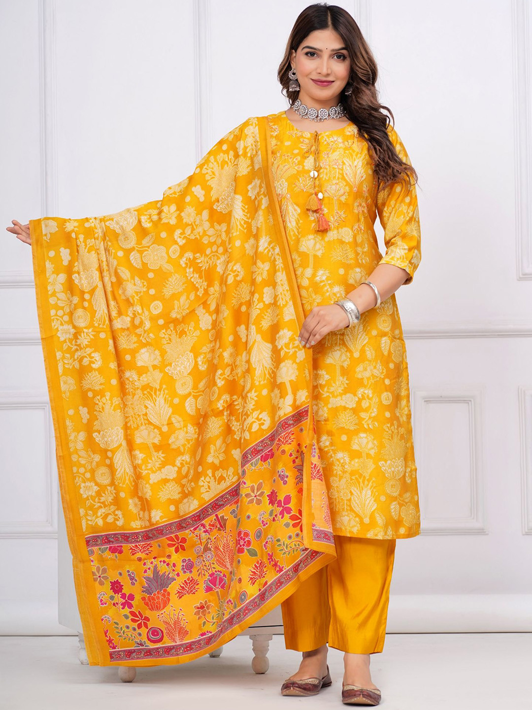 KALINI Women Printed Beads and Stones Pure Silk Kurta with Trousers & With Dupatta, Yellow
KALINI Women Printed Beads and Stones Pure Silk Kurta with Trousers & With Dupatta, Yellow