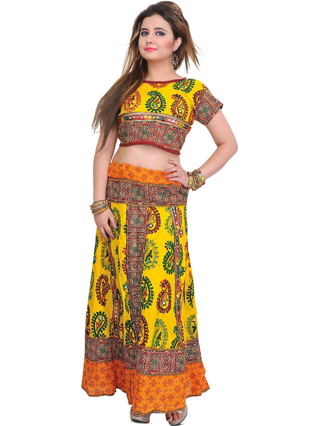 Exotic India Pure Cotton Printed Paisleys Two-Piece Lehenga Choli and Embroidered Patches, Yellow
Exotic India Pure Cotton Printed Paisleys Two-Piece Lehenga Choli and Embroidered Patches, Yellow