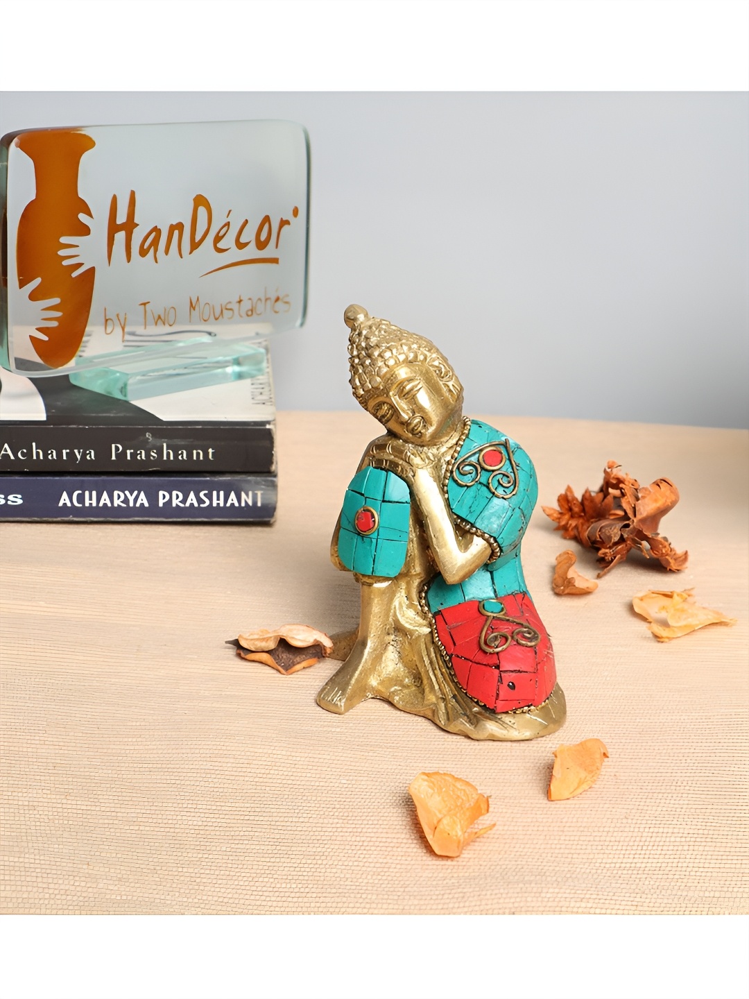 Two Moustaches Gold toned & Blue Brass Buddha Resting on Knee Gemstone Work Showpiece
Two Moustaches Gold toned & Blue Brass Buddha Resting on Knee Gemstone Work Showpiece