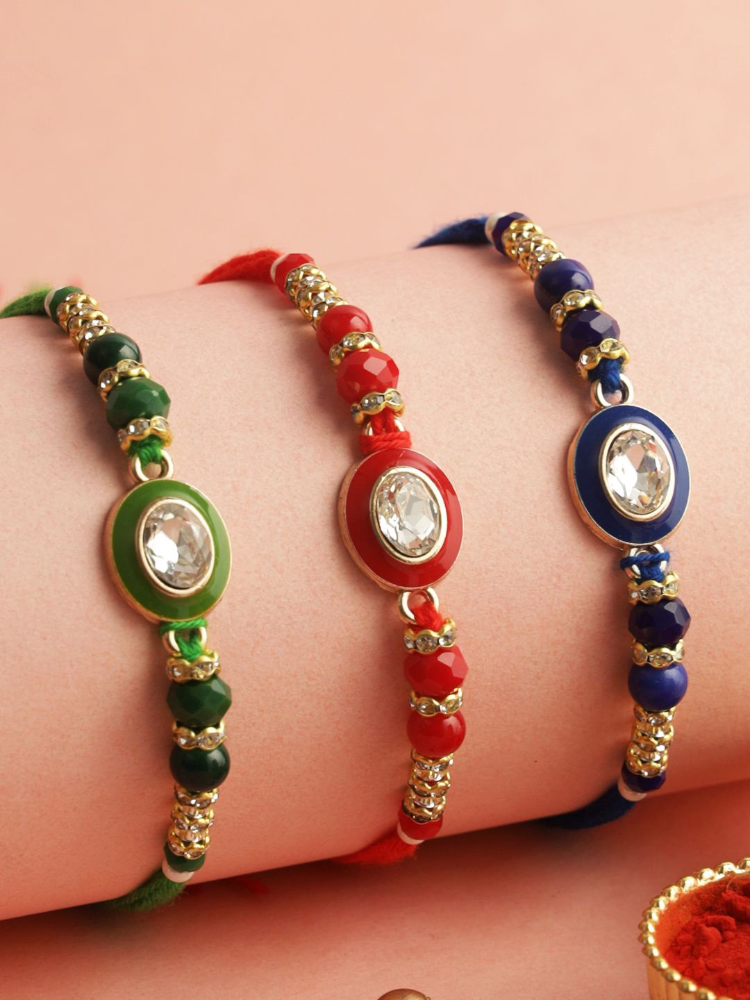 Aapno Rajasthan Set of 3 Stoned-Studded Rakhi with Roli Chawal & Greeting Card, Blue
Aapno Rajasthan Set of 3 Stoned-Studded Rakhi with Roli Chawal & Greeting Card, Blue