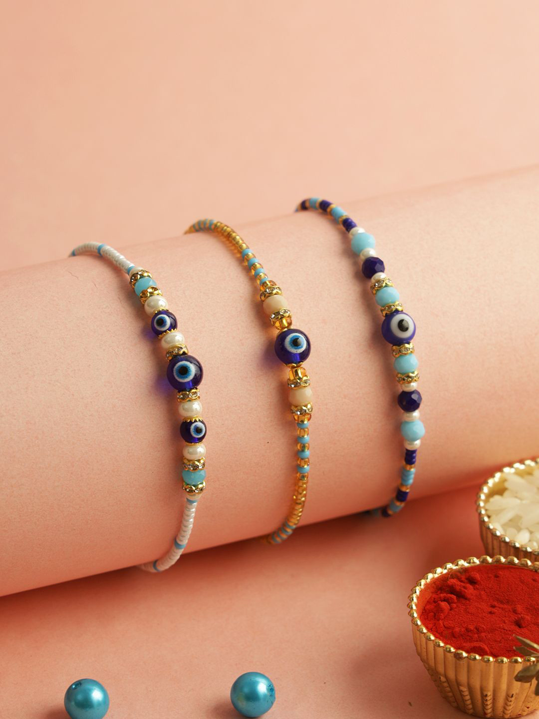 Aapno Rajasthan Set Of 3 Rakshak Rakhis With Roli Chawal & Greetings Card, Blue
Aapno Rajasthan Set Of 3 Rakshak Rakhis With Roli Chawal & Greetings Card, Blue
