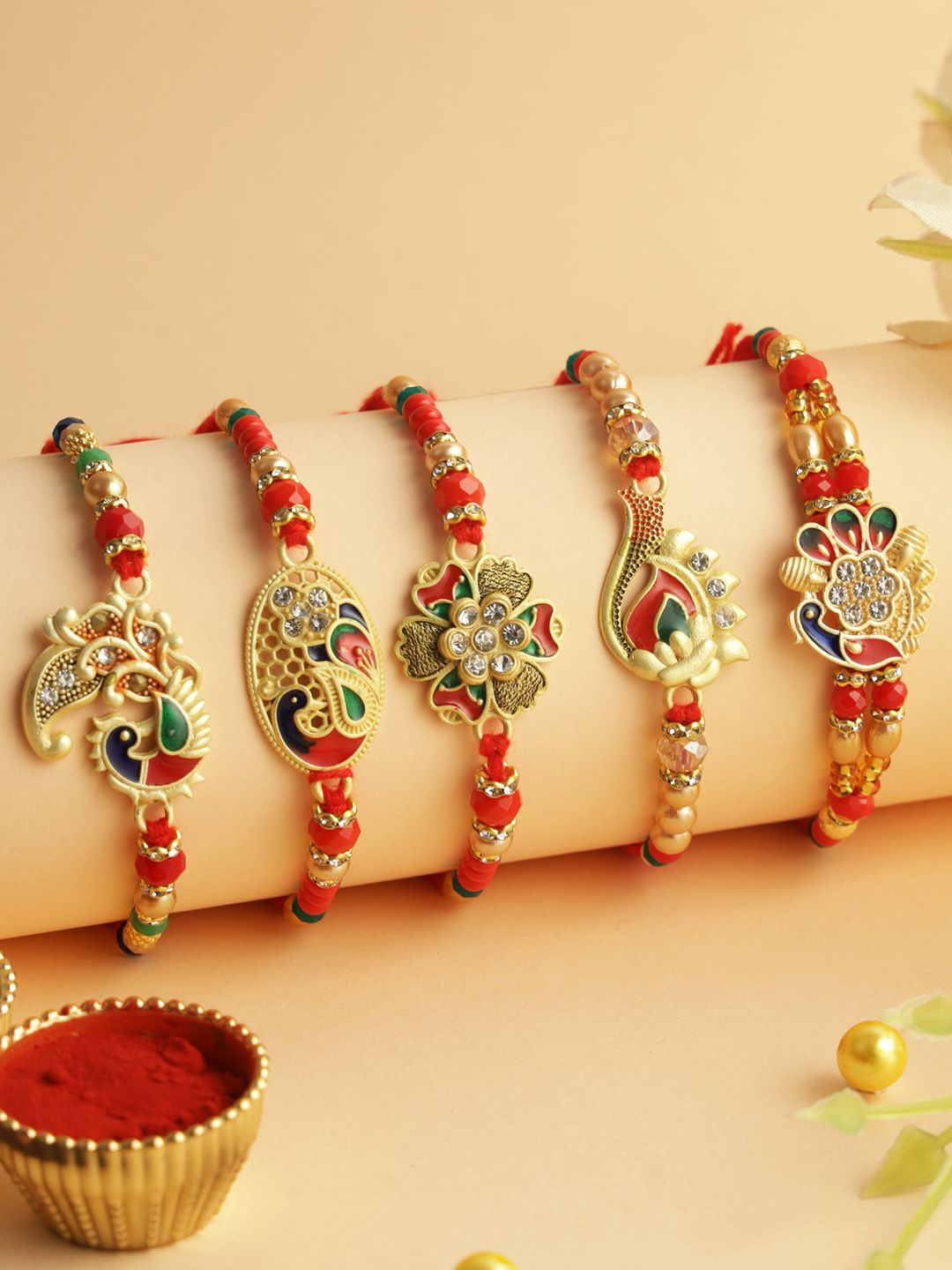 Aapno Rajasthan Set Of 5 Stone Studded & Beaded Rakhis with Roli Chawal & Greetings Card, Red
Aapno Rajasthan Set Of 5 Stone Studded & Beaded Rakhis with Roli Chawal & Greetings Card, Red