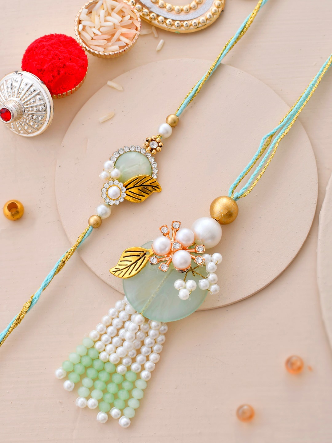 Aapno Rajasthan Set of 2 Stoned-Studded & Beaded Rakhi with Roli Chawal & Greeting Card, Green
Aapno Rajasthan Set of 2 Stoned-Studded & Beaded Rakhi with Roli Chawal & Greeting Card, Green