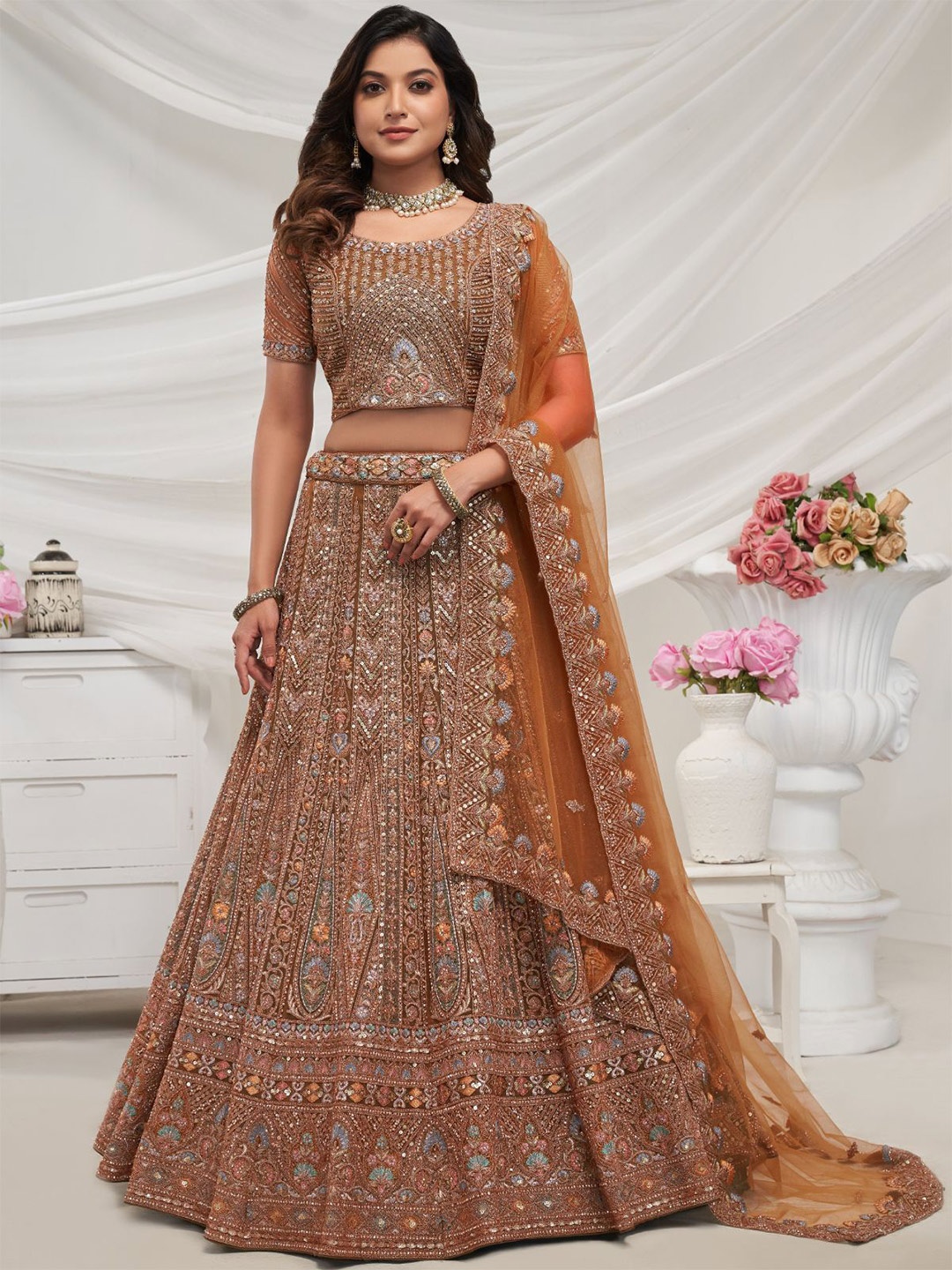 ODETTE Embroidered Sequinned Semi-Stitched Net Lehenga & Unstitched Blouse With Dupatta, Rust
ODETTE Embroidered Sequinned Semi-Stitched Net Lehenga & Unstitched Blouse With Dupatta, Rust