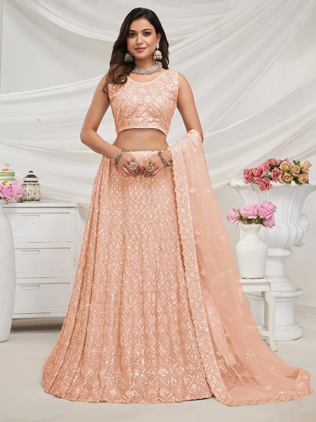 Fusionic Embroidered Sequinned Semi-Stitched Net Lehenga & Unstitched Blouse With Dupatta, Peach
Fusionic Embroidered Sequinned Semi-Stitched Net Lehenga & Unstitched Blouse With Dupatta, Peach